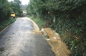 Sunken Lane (Holloway). Surface flow is sediment-laden - blocked drains. Image Credit and Copyright: Hugh Prudden.