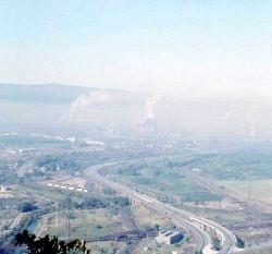The mist in the photo is acid fog, arising from industrial pollution in the Czech Republic. When it rains the rainwater becomes charged with acids and this leads to more rapid acidification of the soil.