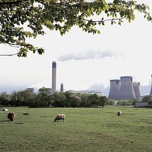 Drax power station, showing the chimneys and cooling towers with sheep grazing. Image credit: Defra, Crown Copyright.