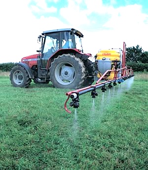 Pesticide application using a Tractor Mounted Sprayer. Where used responsibly, as here, pesticides are beneficial. Innapropriate use can lead to pollution. Image credit: Defra, Crown Copyright.