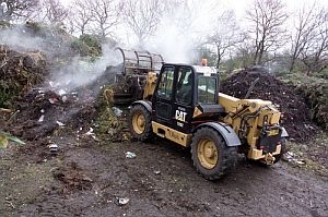 Recycling of green waste at a waste processing plant. The green waste is sorted, shredded, then processed over 16 weeks. This compost is then sold to the trade and through garden centres. Image credit: Defra, Crown Copyright.