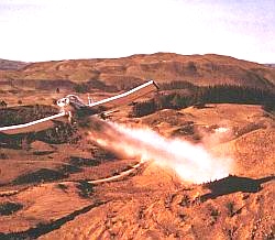 Increasingly there is a tendency to increase the amount of fertiliser added to soils to improve productivity, especially in the developed world. Fertilisers can be added by hand or from aeroplanes as here in New Zealand.