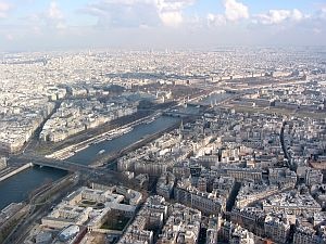 Paris panorama from the top of the Eiffel tower - what a view. Paris, in France, is densely populated, but the underlying landscape is still quite visible from up here!