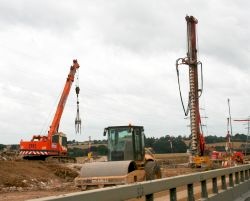 Roadworks for the new M1 motorway widening showing a soil drill ready for use for making sound foundations.