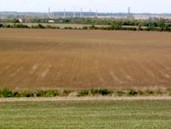 View across lowland Bedfordshire to the distant clay brickworks