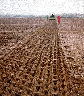 This is a special roller that creates indents in the soil. These indents act like small dams, trapping water and preventing water runoff and erosion.